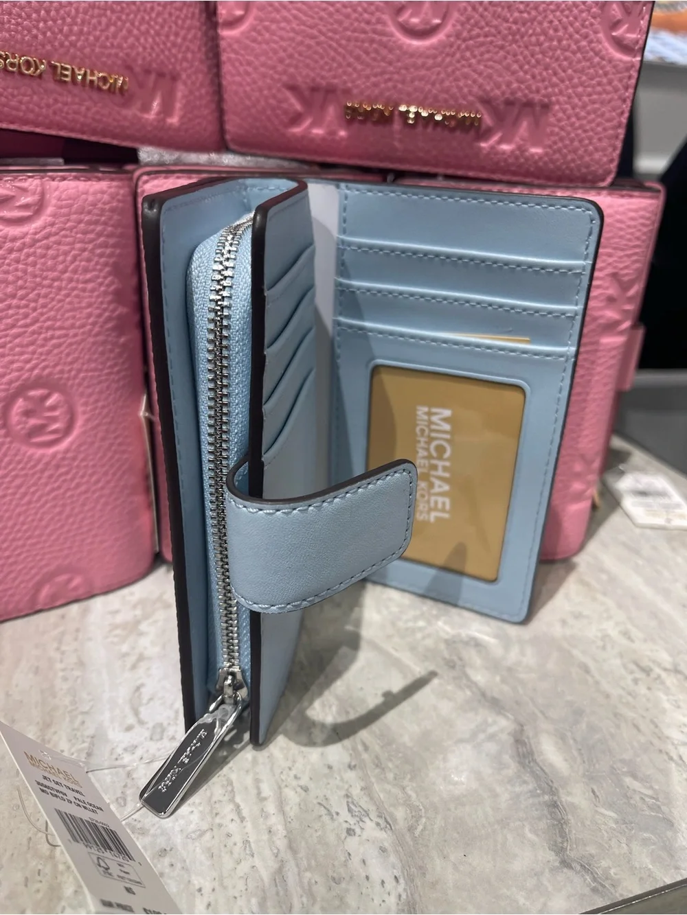 Michael Kors Embossed Logo Trifold Wallet - Light Blue